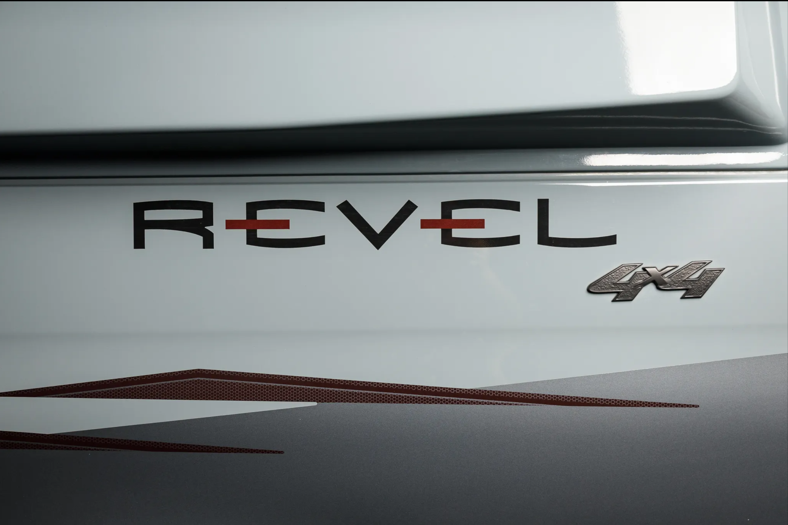 Close-up of the Revel 4×4 badge and graphics